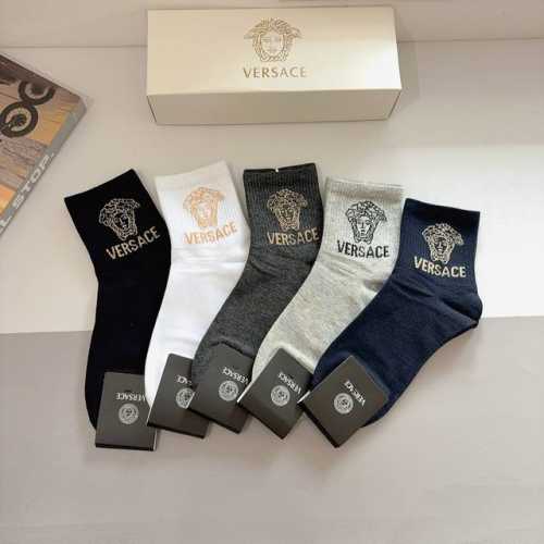 A box of five pairs of Versace men's pure cotton mid-calf socks, a must-have for