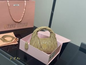 Sheepskin with folding box Size: 20*11cm The Miumiu bowling bag is just the rig