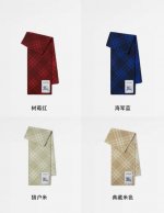 B Brand. This Burberry cashmere and wool blend scarf exudes understated luxury a