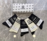 Specially packaged Chanel new mid-length slouch socks! Five pairs per box, same