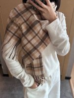 This Burberry check scarf is absolutely gorgeous! It's so stylish and charming,