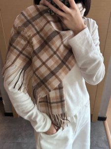 This Burberry check scarf is absolutely gorgeous! It's so stylish and charming,