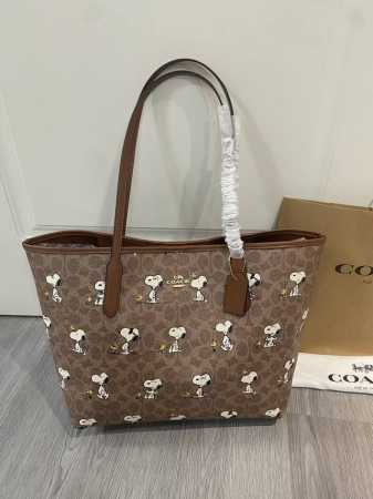 Coach's new May arrival, the new Snoopy City Tote, features the cutest monogram - Click Image to Close
