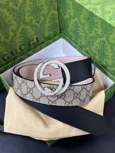 Features the brand's iconic double-G monogram pattern in a beige-ebony color co