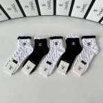 Specially packaged Chanel new embroidered mid-calf slouch socks! Five pairs per