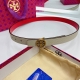Tory Burch reversible belt, featuring the iconic circular double T logo with a s