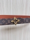 Flowergram Reversible Belt: This belt combines Monogram canvas and Monogram embo