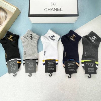 Comes with a box of five pairs of Chanel's popular boat socks, short socks, and