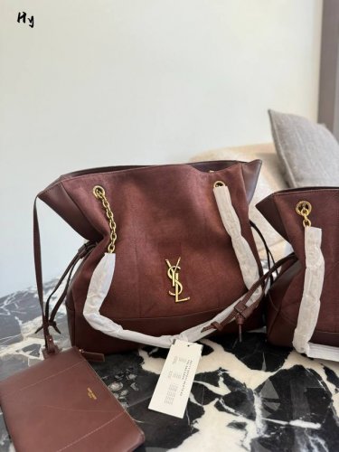 Ysl Drawstring Tote Bag A Ysl Drawstring Tote Bag is made of suede, which is ver