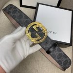 Gucci classic belt with G logo pattern and matte sole; paired with an original s