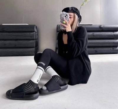 Comes with packaging. A box of four pairs of Chanel's popular mid-calf socks, h