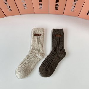 Special packaging for Miu Miu's new cashmere slouch socks! Two pairs per box, s