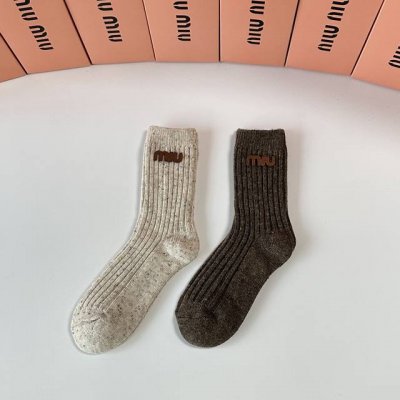 Special packaging for Miu Miu's new cashmere slouch socks! Two pairs per box, s
