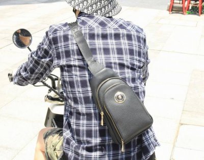 Sold out! This vintage-inspired chest bag from Wang Fanjia is crafted from genui