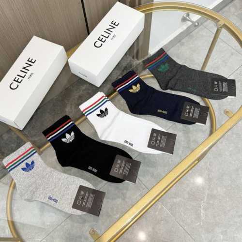 A box of five pairs of high-quality Adidas socks with packaging