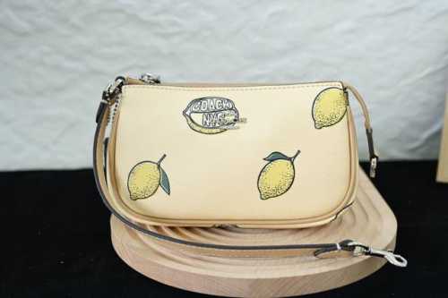 Coach's new April Mahjong bag, featuring classic cowhide colorways, can be carri