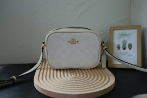 Coach's new City Tote preppy camera bag. New for May: C Y752. The City Tote come