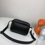 Bv woven messenger bag, a popular item, is made entirely by hand. The soft impor