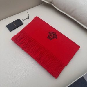 Versace's classic Medusa scarf, made of a wool blend, is soft and warm. A must-h