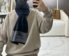 Burberry's hot-selling new high-end men's scarf in a classic warhorse check patt