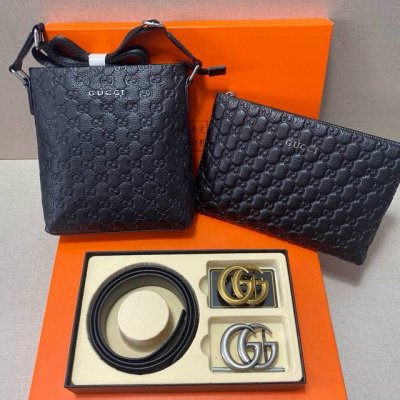 This Gucci belt and two bags come in a gift box. This practical briefcase is a