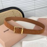 Metal buckle. Belt loops with laser engraved logo. This suede leather belt is s