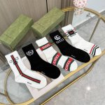 A box of five Gucci socks with packaging. A popular Gucci item, now available! T