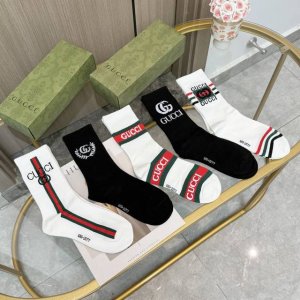 A box of five Gucci socks with packaging. A popular Gucci item, now available! T
