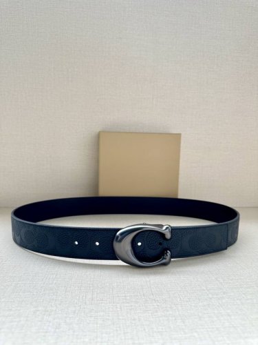 3.7cm wide Coach reversible belt is crafted from sporty calfskin and features a