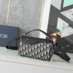 This Roller bag with a shoulder strap combines elegant style with practical desi