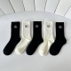 Special packaging for Moncler's latest mid-calf embroidered slouch socks! Five p