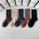 Specially packaged Chanel new embroidered mid-calf slouch socks! Five pairs per