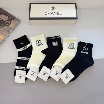 A box of 5 pairs of Chanel classic mid-calf socks, made of pure cotton, featurin