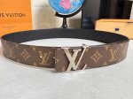 -Lv Fiower reversible belt made of Monogram coated canvas, with Lvfiower embosse