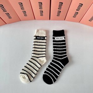 Special packaging for Miu Miu's new striped cashmere slouch socks! Two pairs per